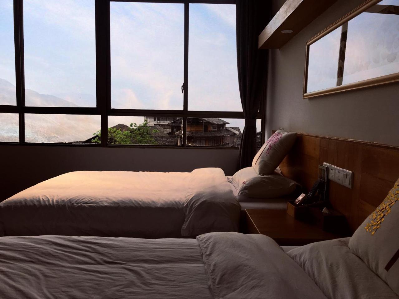 Travelling With Hotel Long Ji Ping An Longsheng Buitenkant foto
